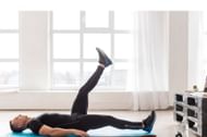 Lying leg raises. (Image credits:Freepik)